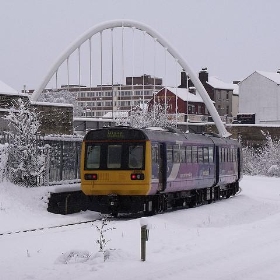 Northern Rail 142 056 and Bolton Arch - Pimlico Badger