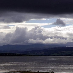 Dark clouds over western end of Beauly Firth Inverness Scotland - conner395