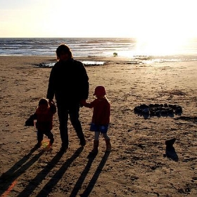 Lexie, Candy and Ella leave the sandcastle, Littlehampton, Jan. 2007 - PhillipC