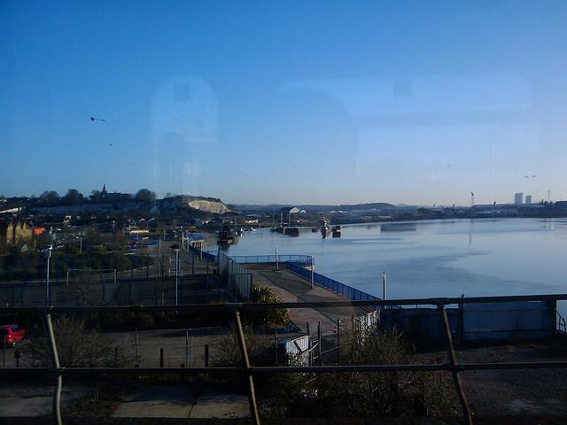 Train ride into work over medway river.